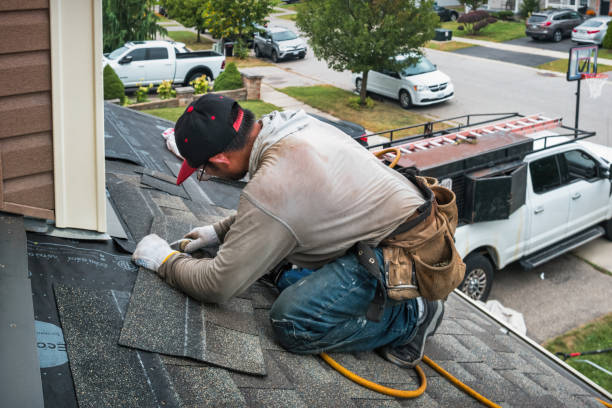 Professional Roofing technician working in Hopedale, MA